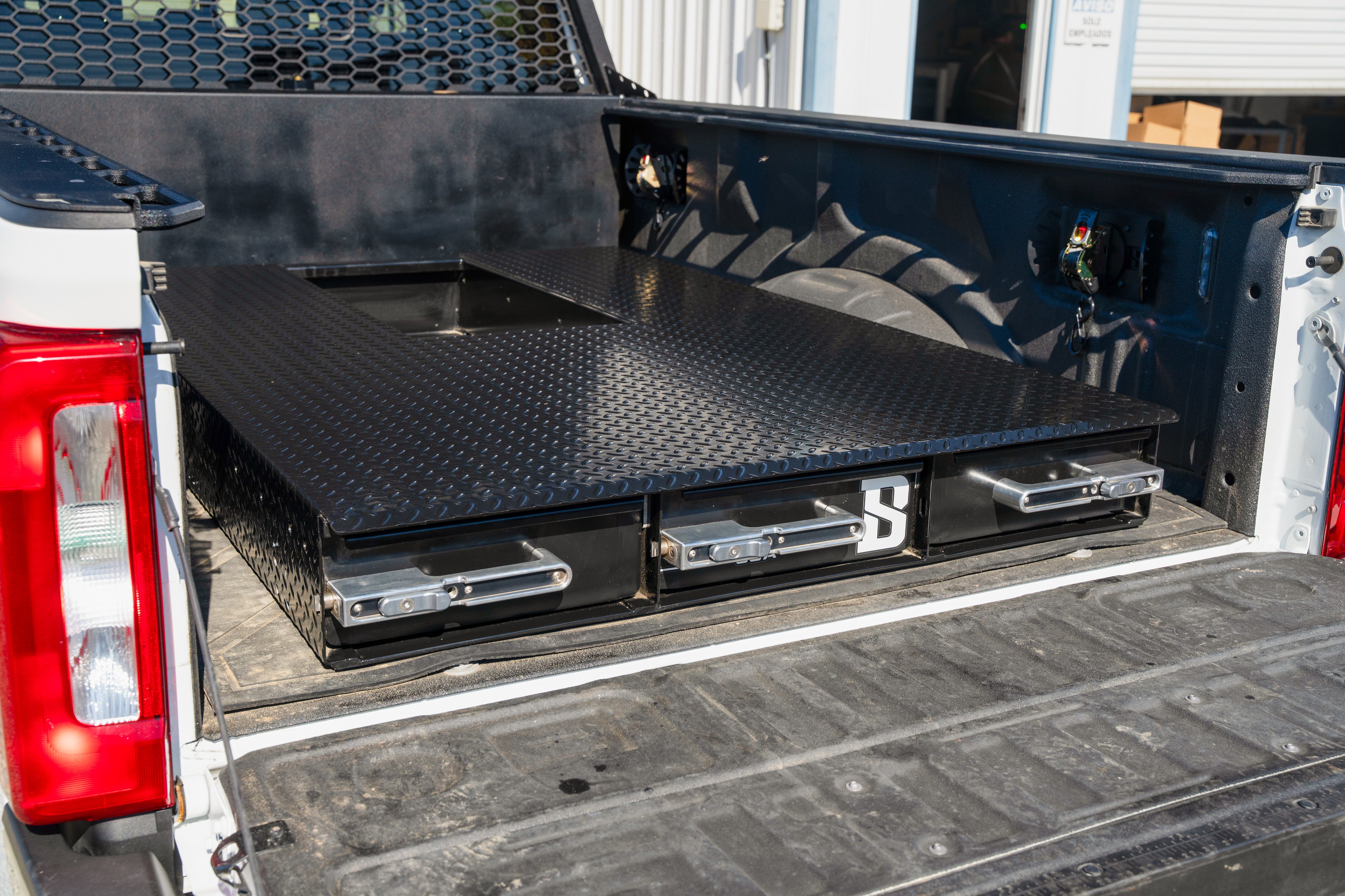 Three-Drawer Steel Tool Box – Heavy-duty storage with billet latches, customizable drawers, and gooseneck ball clearance for towing.